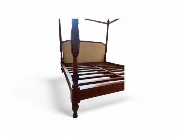 Traditional canopy bed frame with rich wood finish