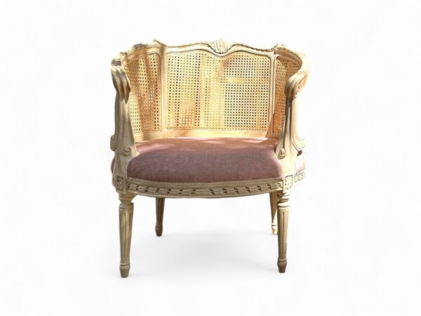 Antique Roselle Chair with carved wooden frame and cane backrest