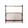 Classic four poster wooden canopy bed in Venetian style
