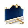 Designer upholstered bed with carved frame