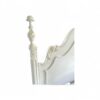 Romantic white French bed with classic carved details and soft finish