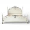Timeless vintage French bed with ornate scrollwork design