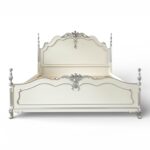 Timeless vintage French bed with ornate scrollwork design