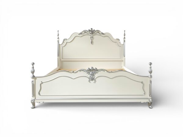 Timeless vintage French bed with ornate scrollwork design