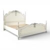 Romantic white French bed with classic carved details and soft finish