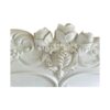Vintage French bed with detailed headboard and elegant curves