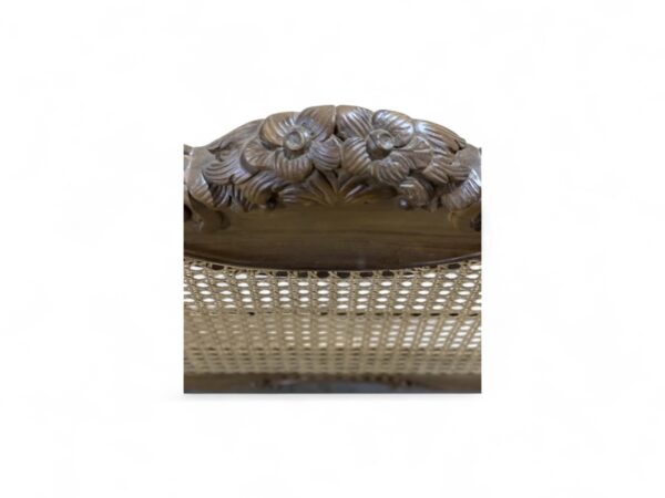 Antique-inspired wooden bed with full cane headboard and footboard
