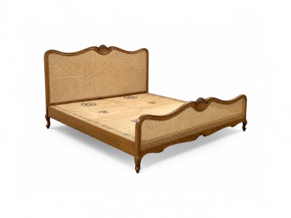 French country-style cane bed with organic woven texture