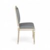 Traditional European-style chair with detailed frame and plush seat