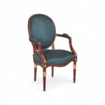 Regal Teal Louis-Style Armchair with carved gold accents and teal upholstery
