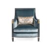 Elegant velvet armchair with black lacquered frame and golden detailing
