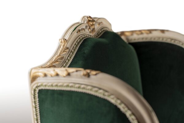 Hand-carved wooden armchair with emerald velvet and gold details