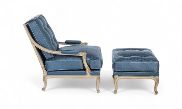 Elegant armchair with matching ottoman in light blue velvet