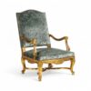 Ornate green velvet armchair with carved gold frame