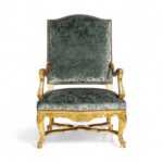 Golden Fern Armchair with green velvet and ornate golden woodwork