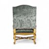 Luxury lounge chair with green velvet and antique gold finish