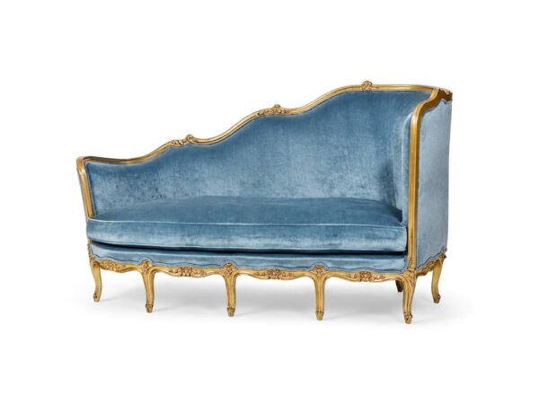 Side view of French Chaise Lounge showing detailed carved gold frame