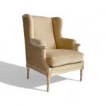 Regal Wingback Armchair with luxurious upholstery and wooden frame