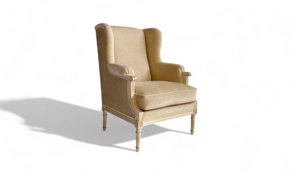 Regal Wingback Armchair with luxurious upholstery and wooden frame
