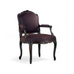 Ebony Splendor Armchair with intricate carvings and red upholstery