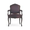 Luxury vintage armchair with ebony wooden frame and plush seating