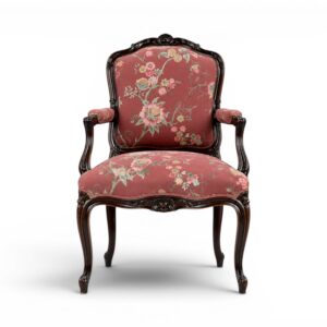 Ebony Splendour Armchair with intricate carvings and floral upholstery