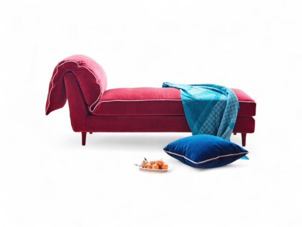 Elegant chaise lounge with gold base and cushioned seat