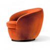 Modern swivel lounge chair with curved design and plush velvet