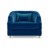 Deep blue velvet armchair with plush cushioning for comfort
