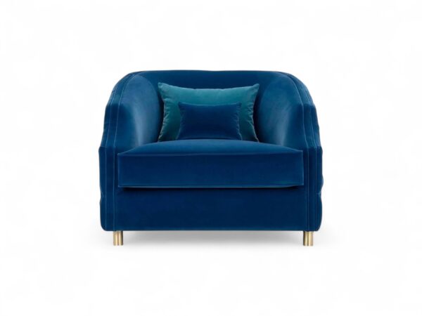 Deep blue velvet armchair with plush cushioning for comfort
