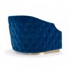 Modern velvet chair with elegant tufting and gold metal details