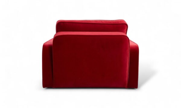 Stylish red velvet armchair with luxurious cushioning