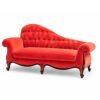 Luxurious red velvet chaise lounge with rolled arms
