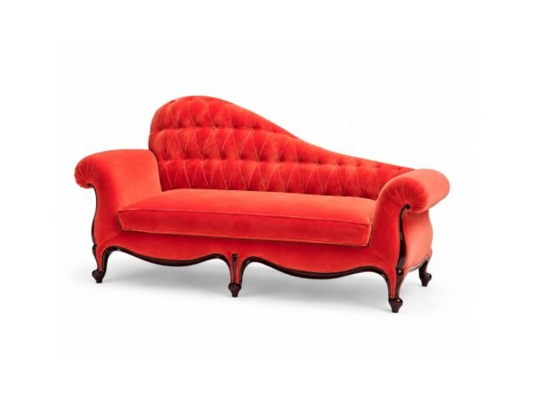 Luxurious red velvet chaise lounge with rolled arms