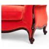 Luxurious red velvet chaise lounge with rolled arms
