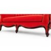 Luxurious red velvet chaise lounge with rolled arms