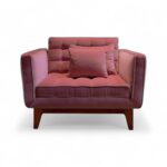 Blush Velvet Armchair with tufted upholstery and wooden legs