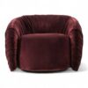 Luxury accent chair with swirl-inspired silhouette