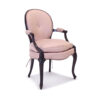 Designer armchair with luxurious velvet and vintage wood craftsmanship