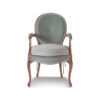 Luxury armchair with intricate wood details and plush cushioning