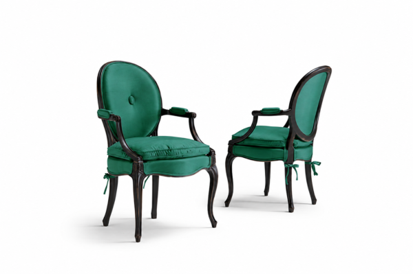 Elegant velvet armchair with carved wooden frame
