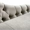Elegant chaise lounge with gold base and cushioned seat