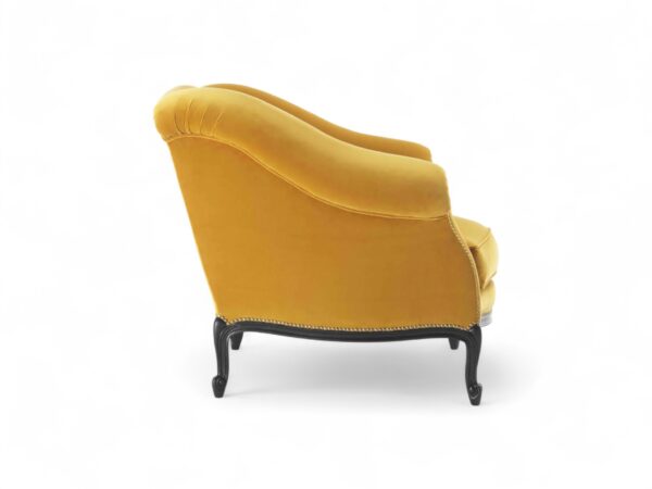Curved scroll arm armchair in mustard velvet finish