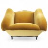 Elegant mustard velvet chair with dark wood detailing