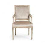 Antique Carved Chair with classic wood frame and neutral fabric