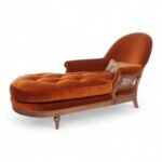 Opulent Orange Chaise Lounge with tufted seat and wooden frame