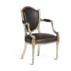 Luxury armchair featuring rich purple velvet and carved silver details