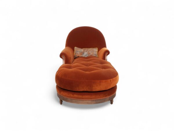 Elegant Opulent Orange Chaise Lounge with plush padding and turned wooden legs