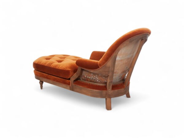 Vintage-inspired Opulent Orange Chaise Lounge in a sophisticated living room