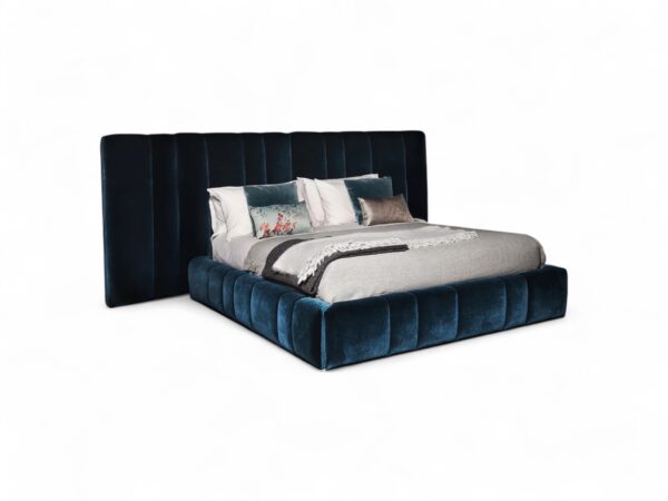 Twilight Splendor Bed with tufted blue velvet headboard and plush base.